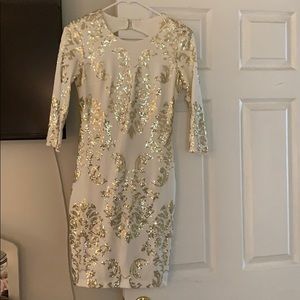 White and gold sequin dress